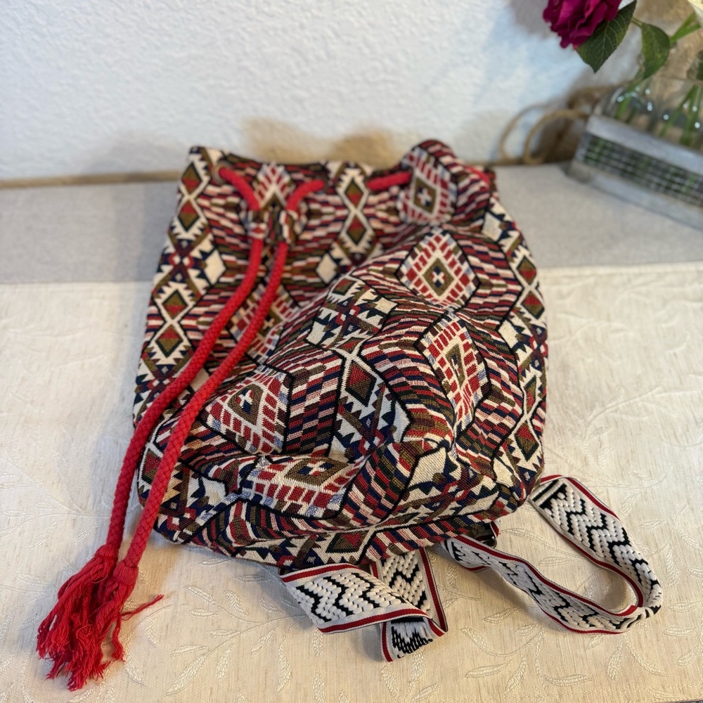 Woven Tapestry Aztec Patterned Drawstring Backpack. 15x15. Multicolor